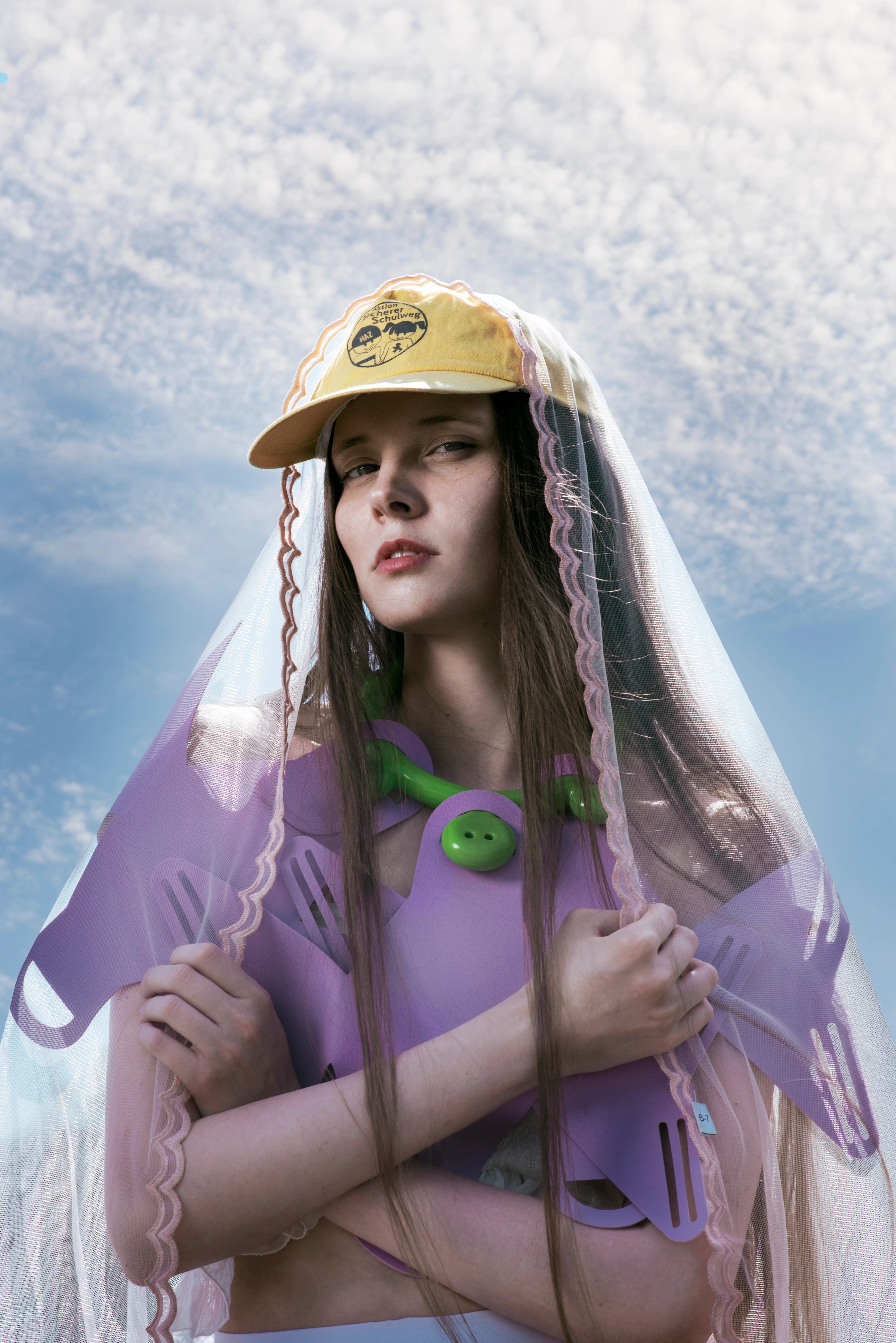 Model wearing garments found on the streets of Berlin and upcycled by Olya Chuk.
