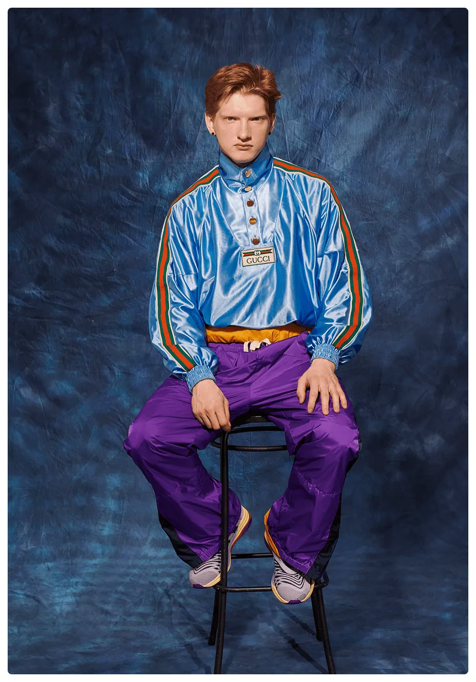 Young actor portrayed as the class athlete in a school yearbook, wearing a colourful Gucci sportswear look.