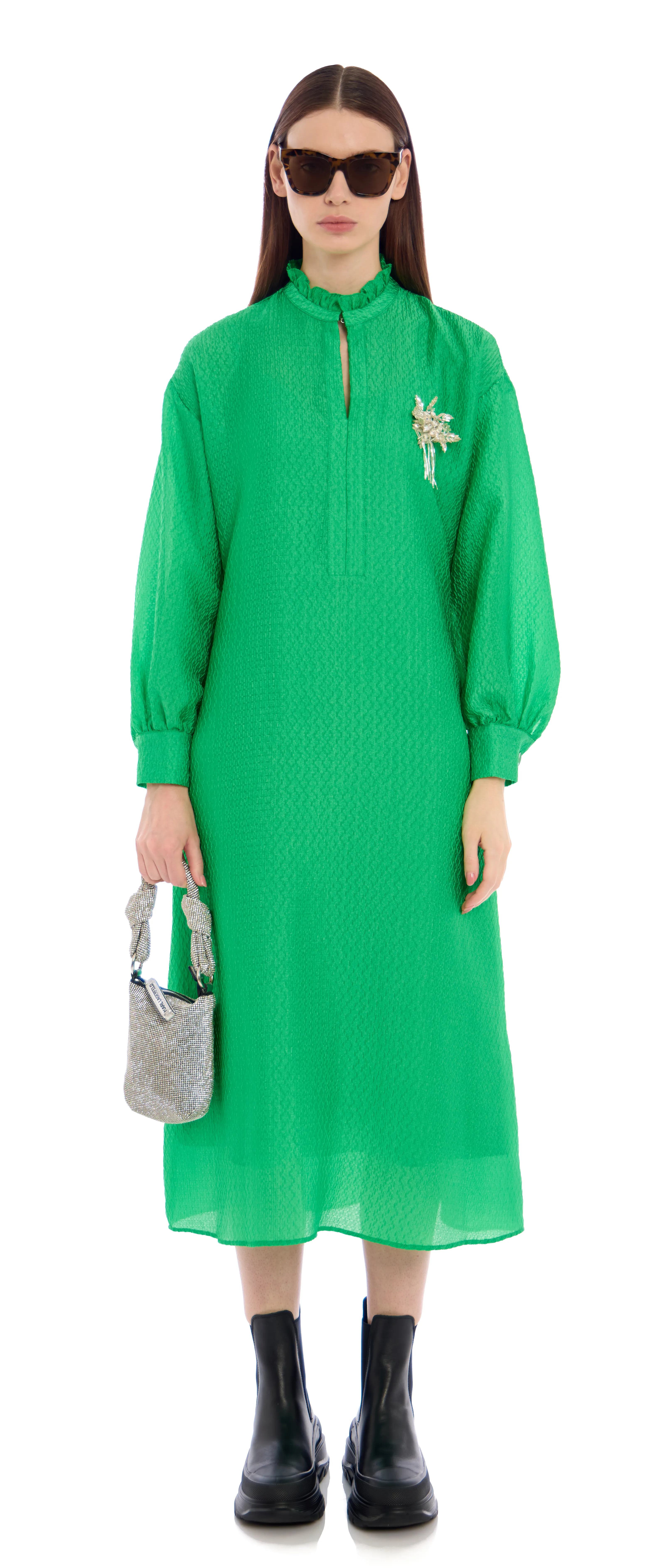 Model styled for Stockmann e-commerce in a monochrome green dress, finished with black boots and sunglasses in Balenciaga aesthetic. One of 60 multi-brand looks styled by Olya Chuk.