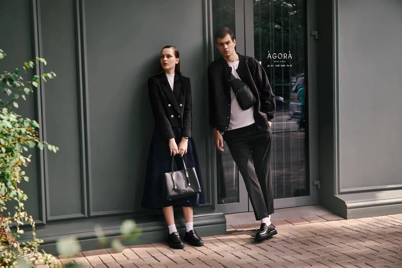 Men's and women's footwear lookbook featuring models in coordinated black tailoring inspired by Yohji Yamamoto's aesthetic, styled by Olya Chuk.